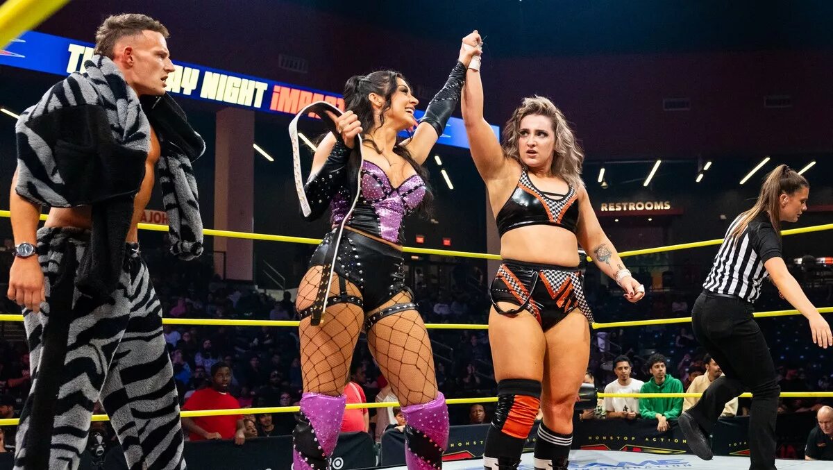 A graphic of the TNA Thursday Night iMPACT episode of March 19, 2026. Arianna Grace and Dani Luna defeated the Angel Warriors