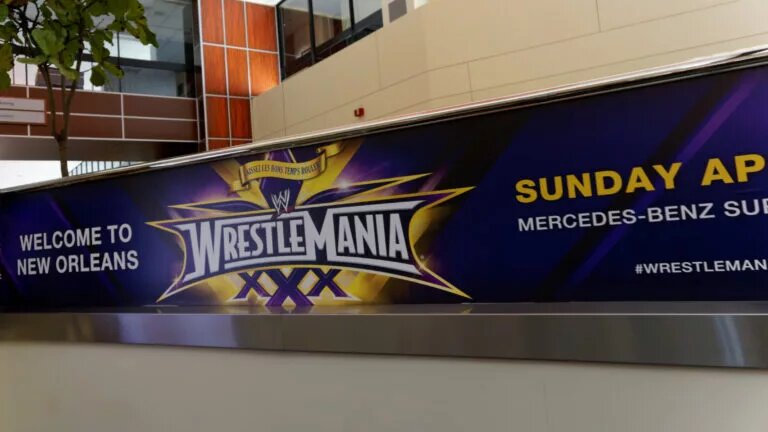 A graphic of WWE WrestleMania XXX, which was held inside an NFL Stadium.