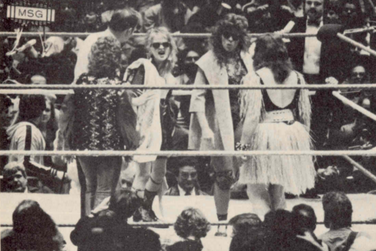 Wendi Richter and Cyndi Lauper (back) face off against Leilani Kai and The Fabulous Moolah (front, facing away) at Wrestlemania I