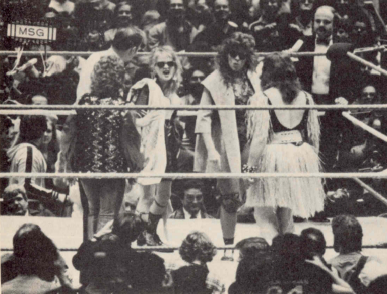 Wendi Richter and Cyndi Lauper (back) face off against Leilani Kai and The Fabulous Moolah (front, facing away) at Wrestlemania I