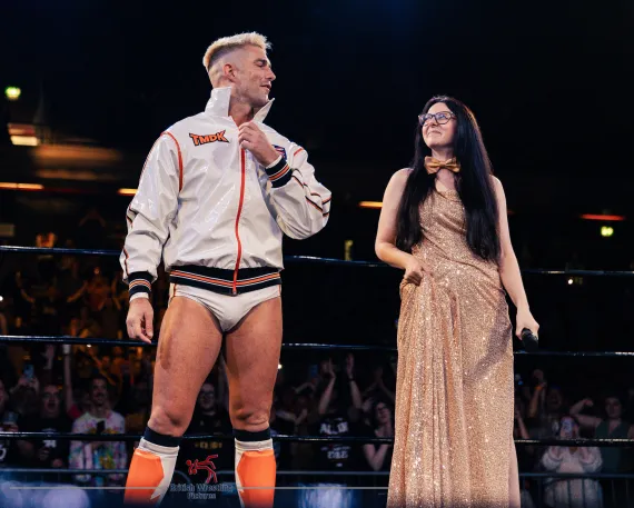 A photo of RevPro ring announcer Francesca Oliver making ring introductions (Photo Credit: British Wrestling Pictures)