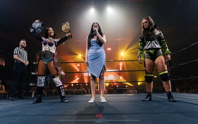 A photo of RevPro ring announcer Francesca Oliver making ring introductions (Photo Credit: British Wrestling Pictures)