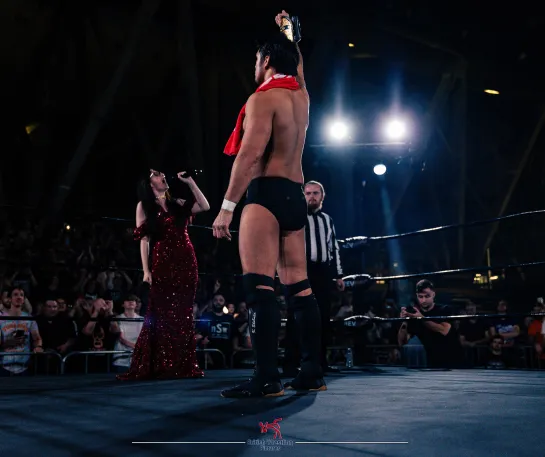 A photo of RevPro ring announcer Francesca Oliver making ring introductions (Photo Credit: British Wrestling Pictures)