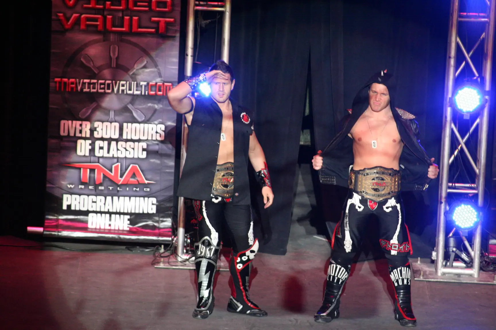 Motor City Machine Guns, Alex Shelley and Chris Sabin, at a TNA Wrestling event in 2010 with the TNA World Tag Team Championships.