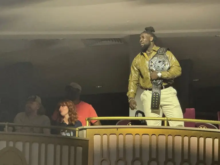 Image of Oba Femi with WWE NXT Championship in the audience