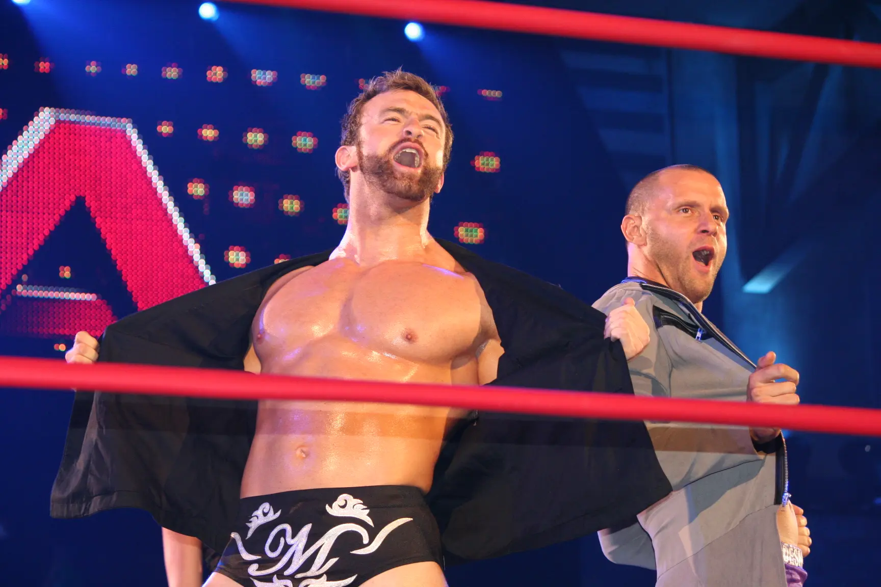 A photo of Nick Aldis, AKA Magnus, with Desmond Wolfe in TNA Wrestling.