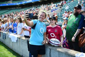 England's Marlie Packer poses for a selfie with fans two months before the Women's Rugby World Cup