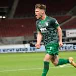 Augsburg's German forward Florian Niederlechner celebrates his goal on May 7, 2021