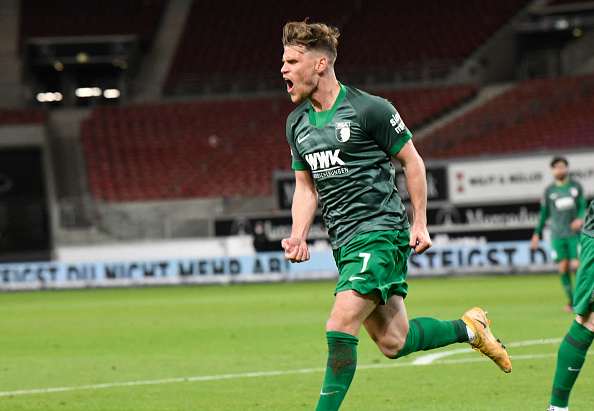 Augsburg's German forward Florian Niederlechner celebrates his goal on May 7, 2021