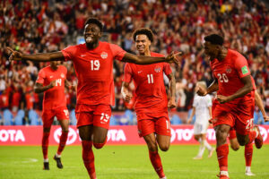 Alphonso Davies goal celebration with Tajon Buchanan and Jonathan David