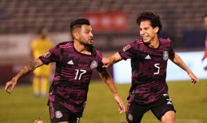Mexico's players Jesus Manuel Corona (L) and Diego Lainez celebrates team goal in Kingston