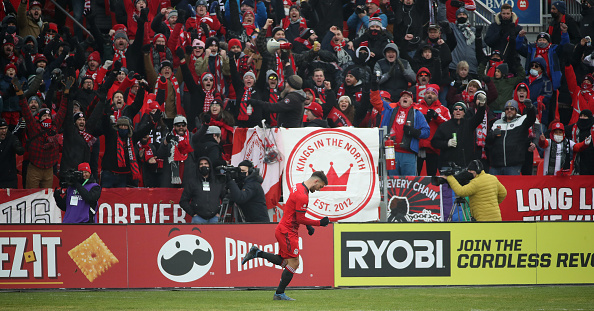 Toronto FC player Jesus Jimenez scores against the New York Red Bulls at BMO Field