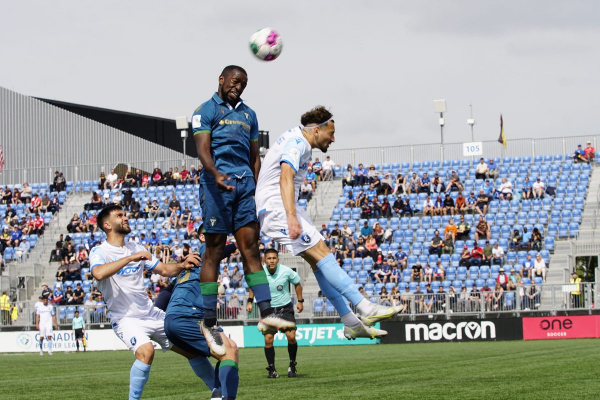 FC and FC Edmonton battles for the ball as FC Edmonton defeats York United FC on July 1, 2022