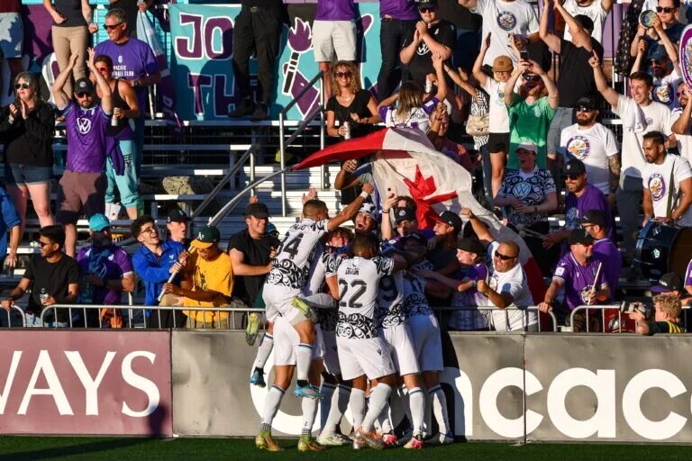 Josh Heard had a terrific game as Pacific FC celebrates goal against Waterhouse F.C.