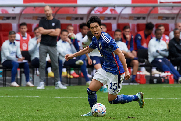 Attacking Japanese midfielder, Daichi Kamada, with the ball as Gregg Berhalter's USMNT loses 2-1 on September 23, 2022