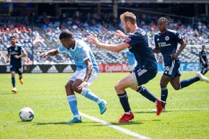 New York City FC forward Héber has the ball as NYCFC and New England battle
