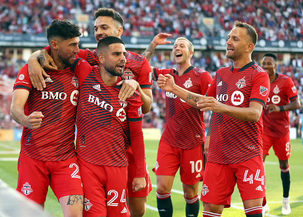 Toronto FC Midfielder Jonathan Osorio Celebrates One of his 2022 Toronto FC Season Goals with his Teammates in Toronto, Ontario