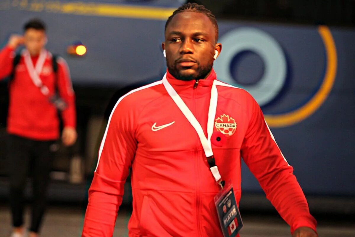 The Canadian Men's Soccer Team are Wearing Poppies Before the Game on November 11, 2022.