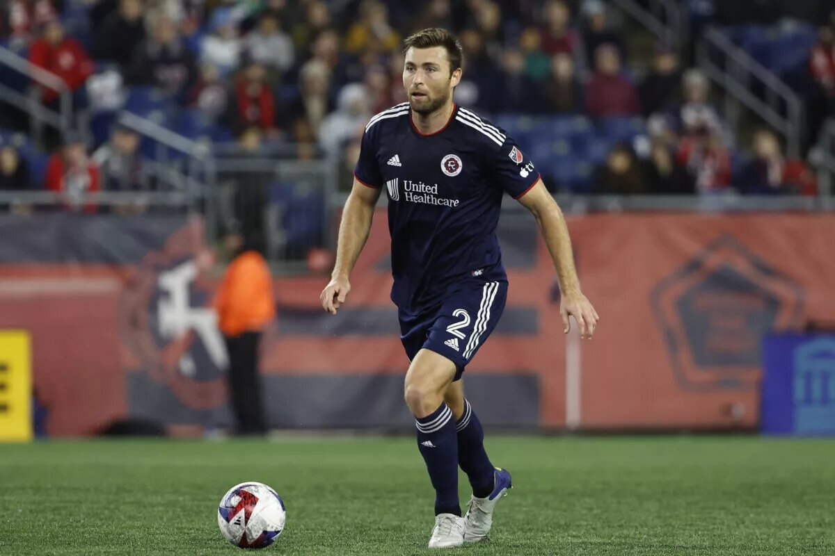Revs defender Dave Romney