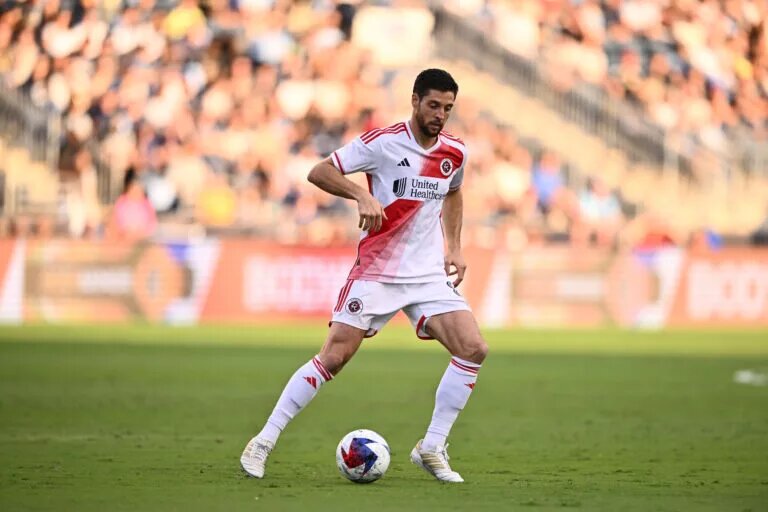 Revs midfielder Matt Polster