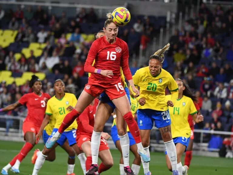 CanWNT Forward, Janine Beckie Heads The Ball Against Brazil