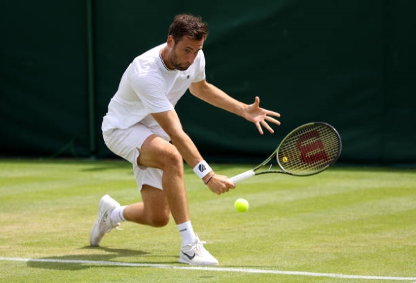 Quentin Halys in action at Wimbledon.