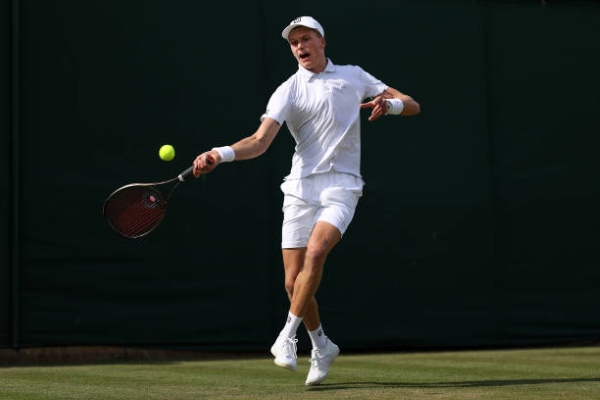 Jenson Brooksby in action at Wimbledon.