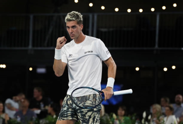 Thanasi Kokkinakis celebrates victory over Andrey Rublev.