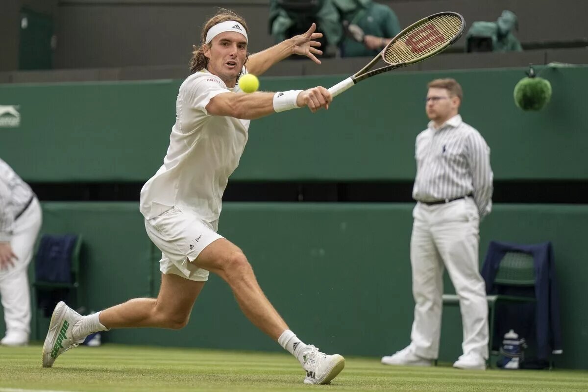 Stefanos Tsistsipas in action at Wimbledon.
