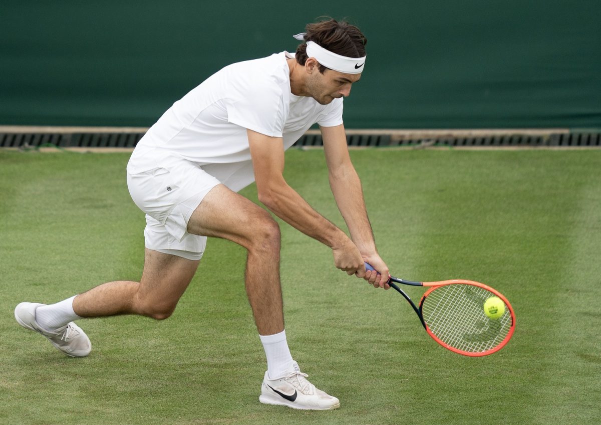 Taylor Fritz in action at Wimbledon.