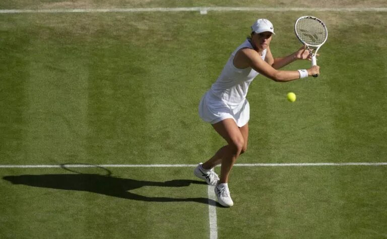 Iga Swiatek in action at Wimbledon.