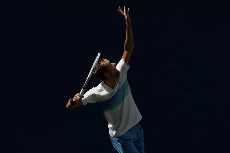Daniil Medvedev in action ahead.