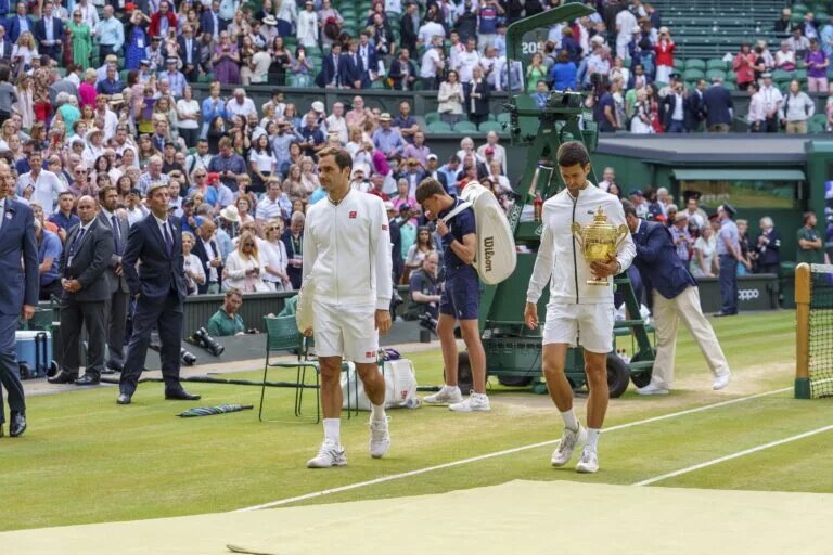 Novak Djokovic saved a championship point to win his 16th Grand Slam.
