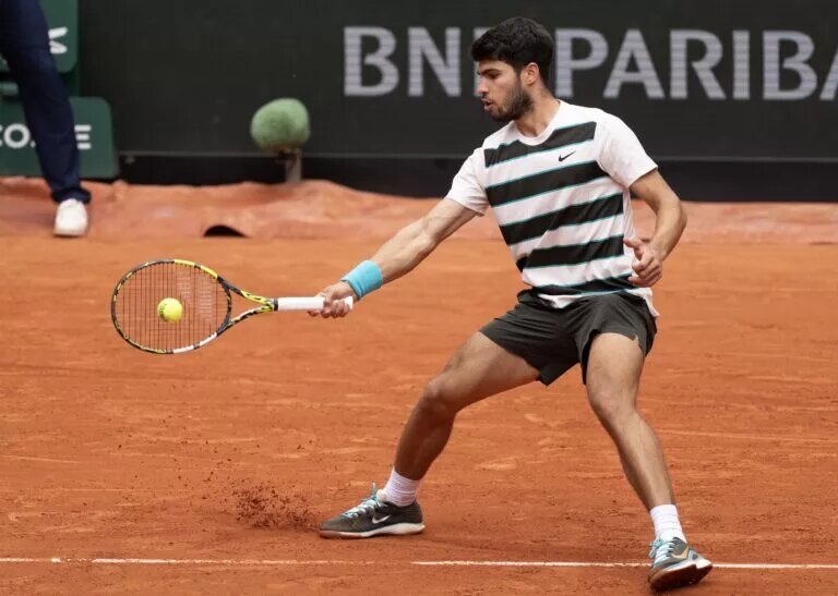 Carlos Alcaraz in action ahead at Roland Garros.