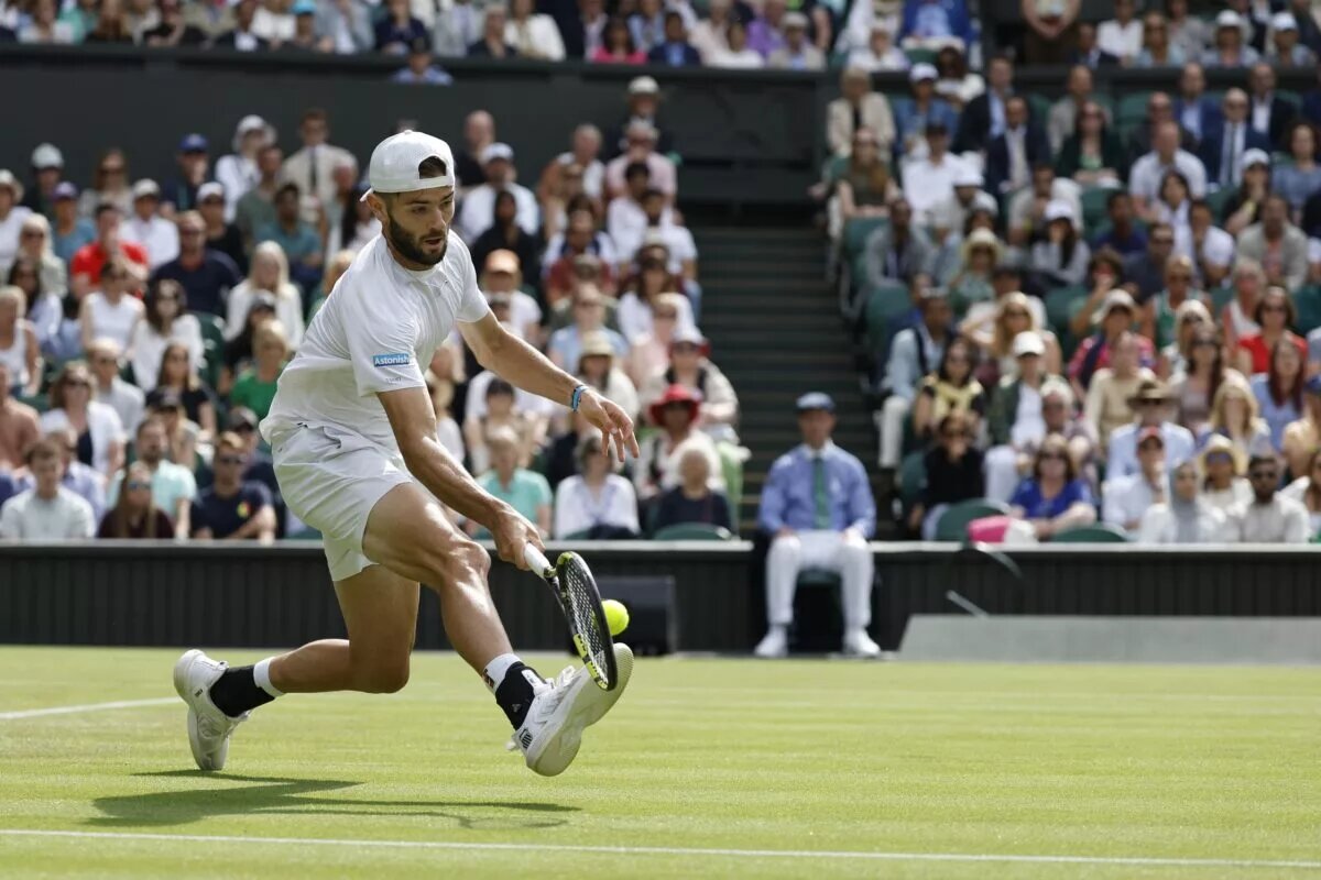 Jacob Fearnley in action at Wimbledon.