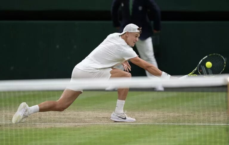 Holger Rune in action at Wimbledon.