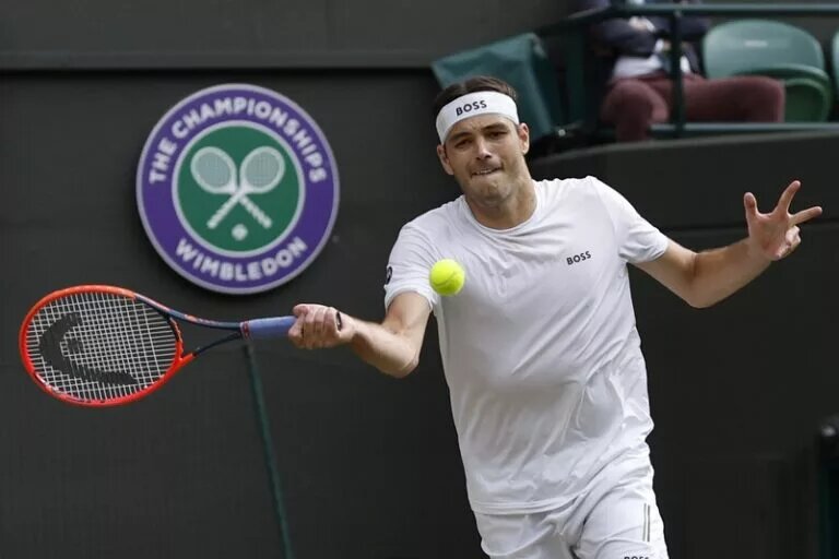 Taylor Fritz in action at Wimbledon.