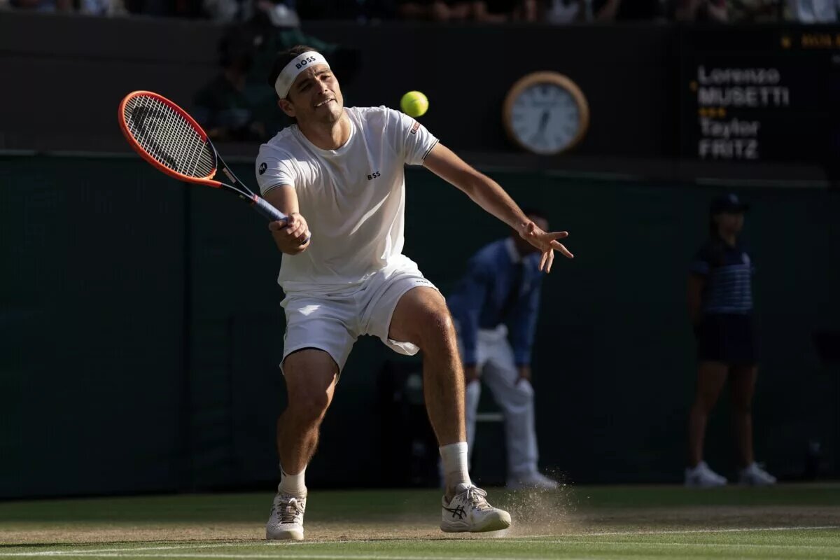 Taylor Fritz in action at Wimbledon.