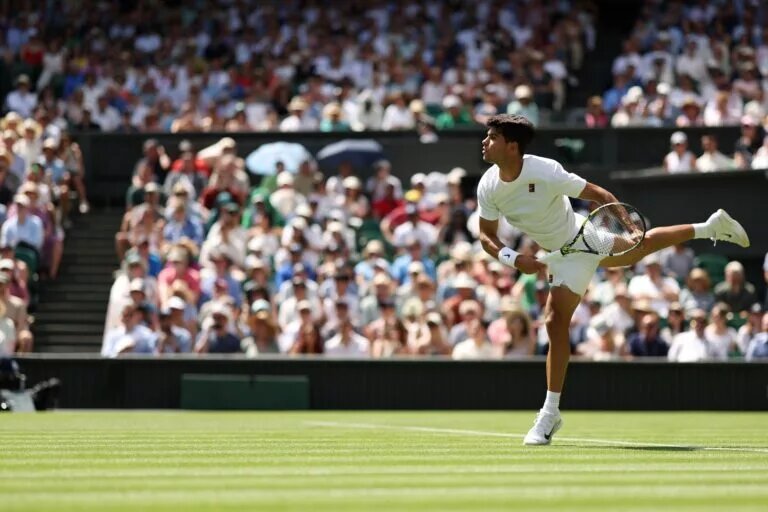 Carlos Alcaraz in action at Wimbledon.