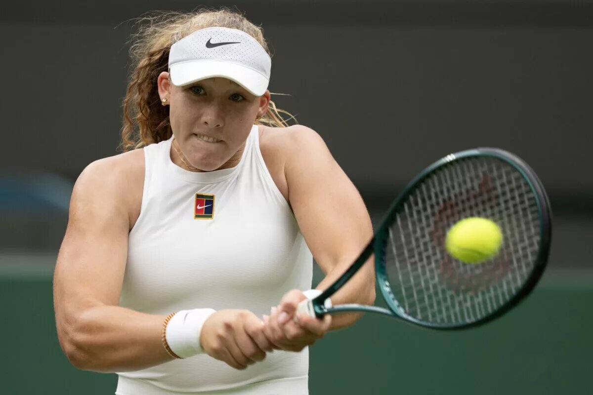 Mirra Andreeva in action at Wimbledon.