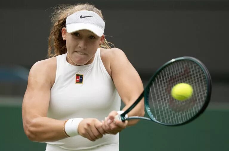 Mirra Andreeva in action at Wimbledon.